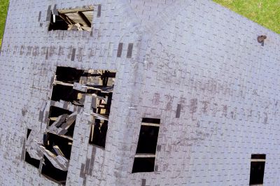 Roof Damage Restoration in Brighton, MI